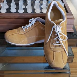 Gold Timberland shoes